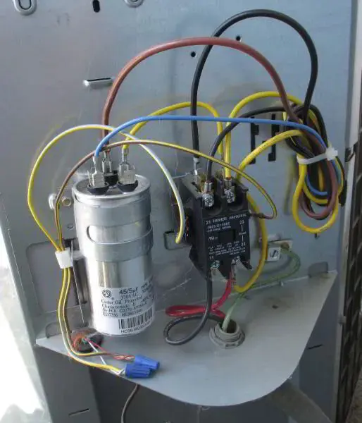 Bad AC Capacitor could be a cause of your AC fan not spinning