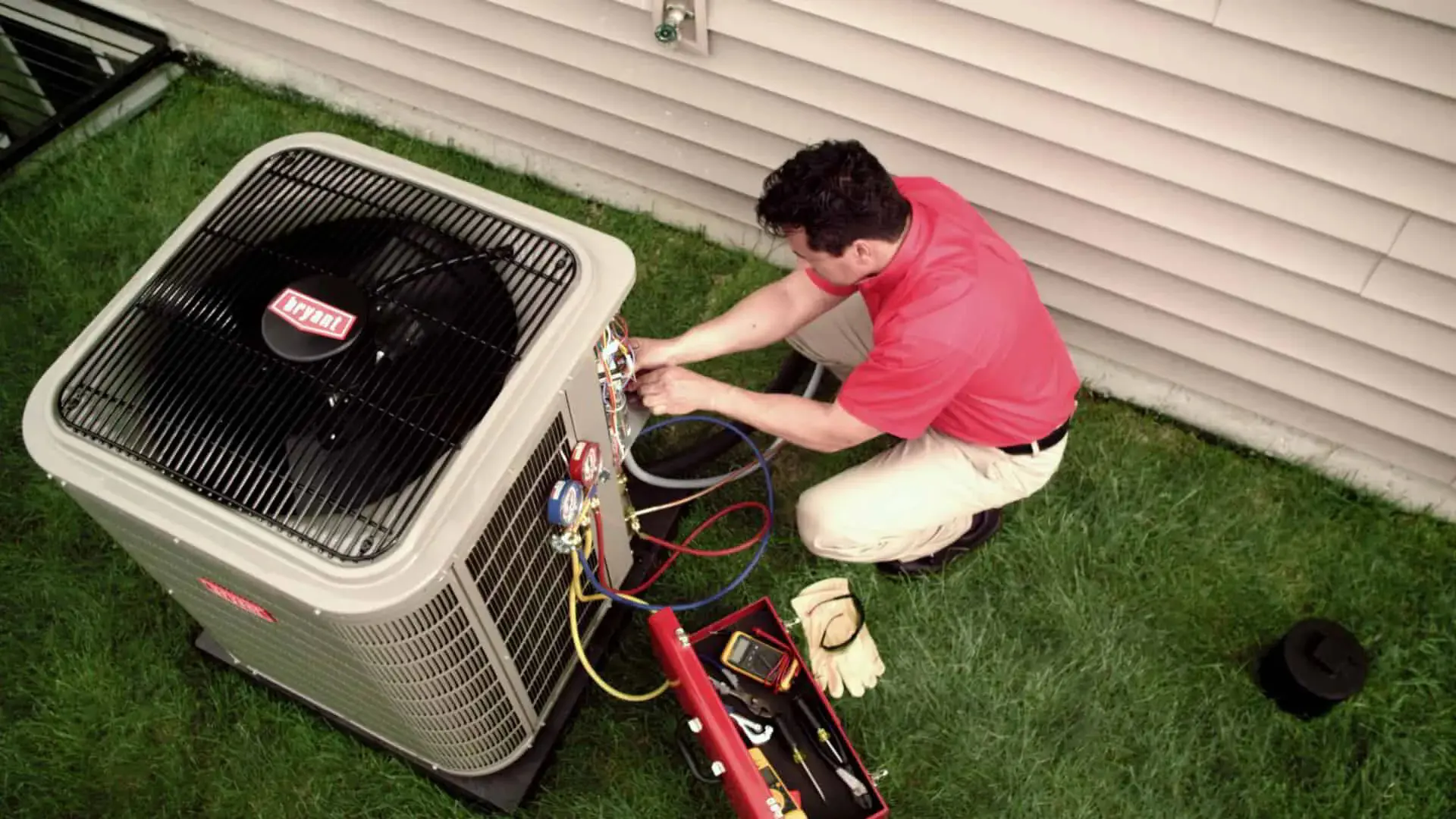 technician installing central air conditioning