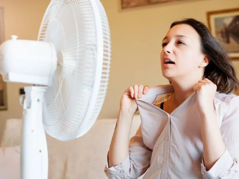 woman sweating inside